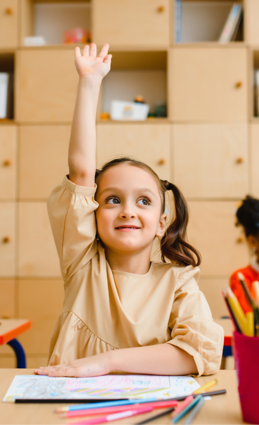 Teacher guiding students through assignment